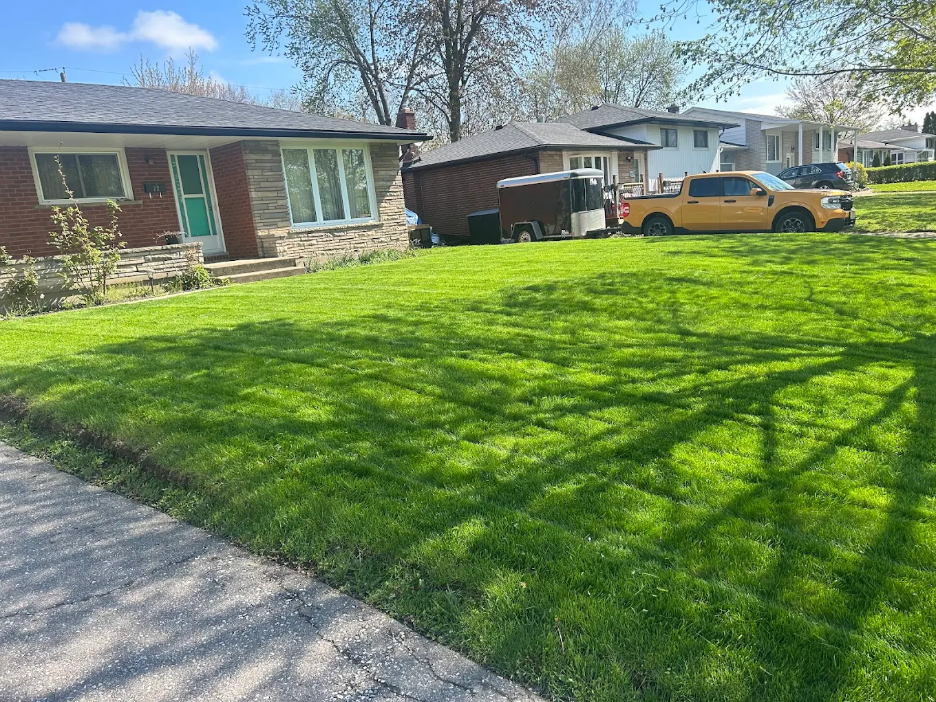 Freshly mowed front lawn with crisp lines
